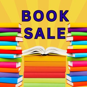 Bright "Book Sale" advertisement with colorful book stacks and bold blue text on a yellow background.